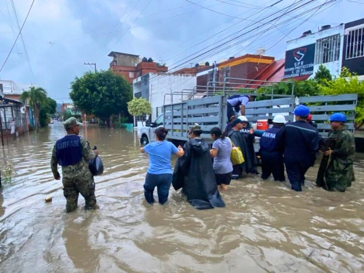 Puebla en emergencia. Marinos al auxilio en las zonas afectadas. AMEXI