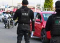 Elementos de la Policía Municipal de Ixtapaluca en el Operativo Peregrino. AMEXI Foto Fb Policía Municipal de Ixtapaluca