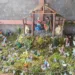 Nacimiento navideño mexicano con el Niño Jesús, María, José, pastores, Reyes Magos y figuras tradicionales de la cultura local.