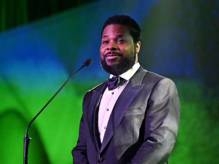 Malcolm-Jamal Warner en un evento público. Tras su fallecimiento, su viuda, Tenisha Delilah Warner, inició un proceso legal relacionado con el cumplimiento de un acuerdo prenupcial.