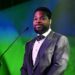 Malcolm-Jamal Warner en un evento público. Tras su fallecimiento, su viuda, Tenisha Delilah Warner, inició un proceso legal relacionado con el cumplimiento de un acuerdo prenupcial.