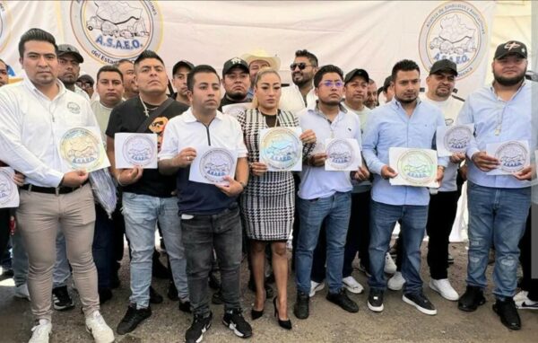 La ASAEO es una agrupación cuyo rostro político es Noé Jara, hermano del gobernador de Oaxaca, Salomón Jara.