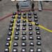 Efectivos de Marina custodian la presunta cocaína asegurada en el Pacífico. AMEXI Foto