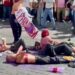 Estudiantes de UAEM protestan durante desfile cívico-militar, por asesinato de Claudia Tacoronte. AMEXI Foto Especial
