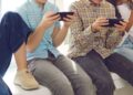 Niños con celulares. AMEXI Foto Canva