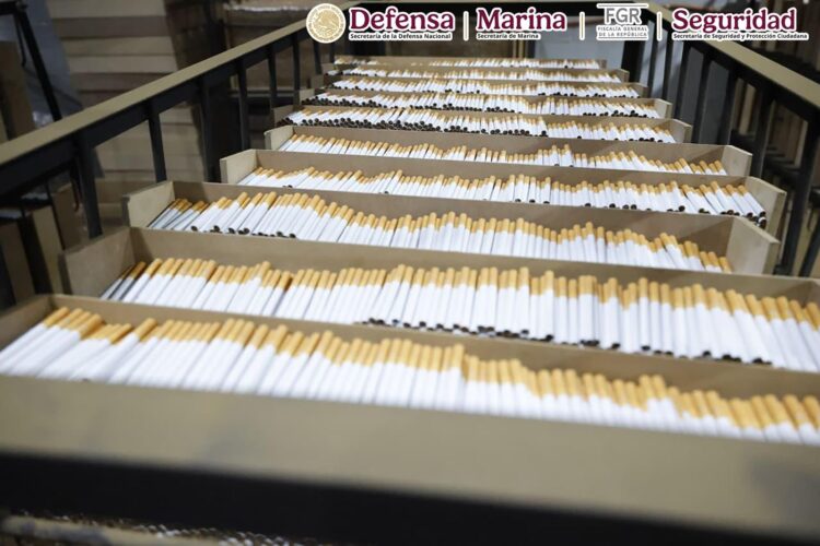 Aseguran casi 60 toneladas de cigarro pirata y detienen a tres personas en Huixquilucan